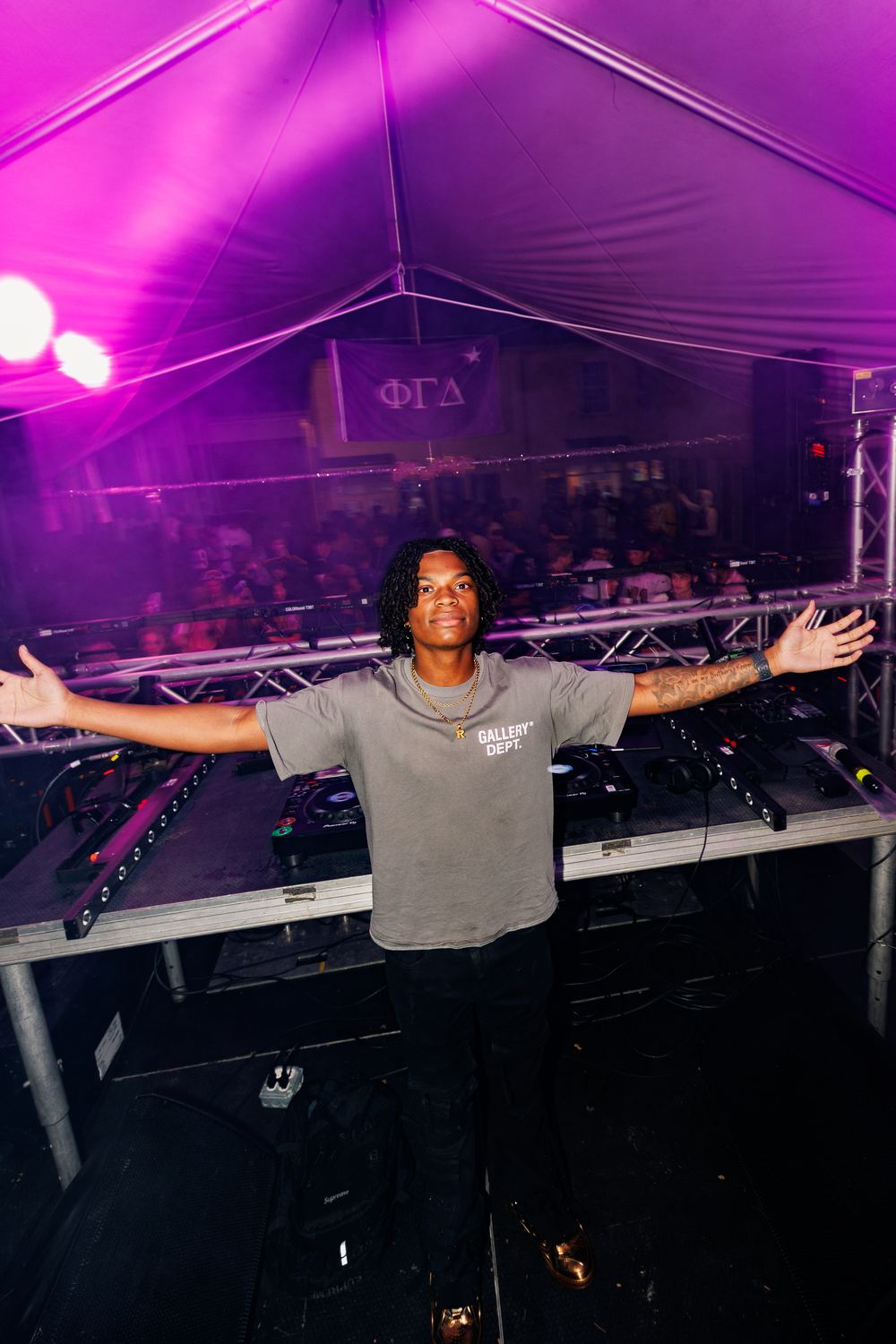 DJ Reese working a packed tent party in Tuscaloosa, Alabama